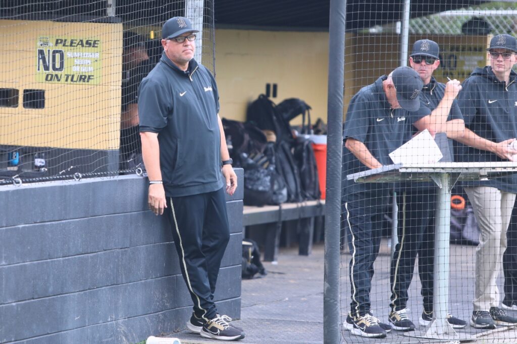 Buchholz baseball coach Ron Brooks (left) announced Wednesday he is stepping down from his head coach position and as the Bobcats athletics director. Photo by C.J. Gish