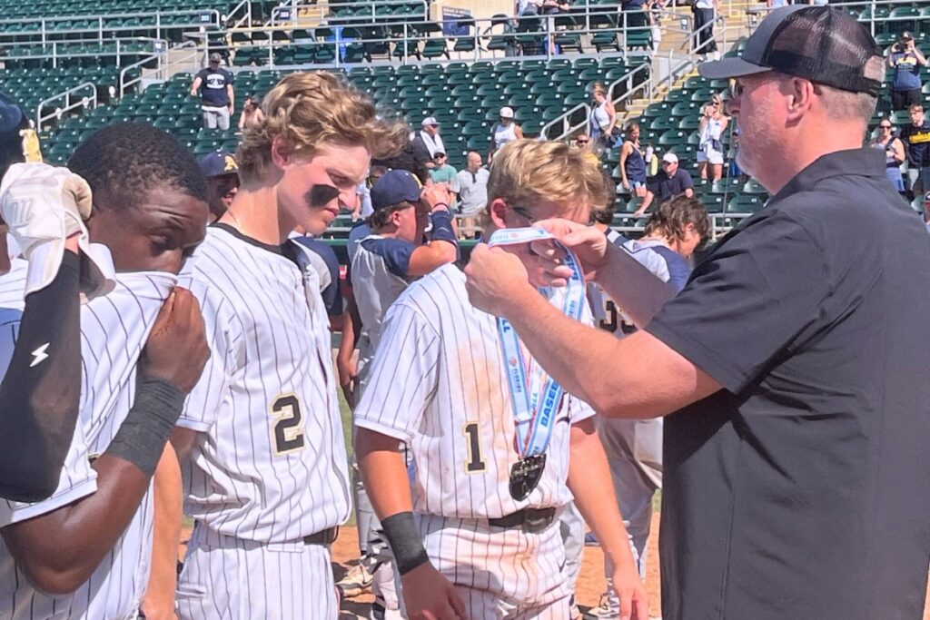 Buchholz players receive medallions following a runner-up finish in the 6A baseball state championship game on Saturday. Photo by Mike Ridaught