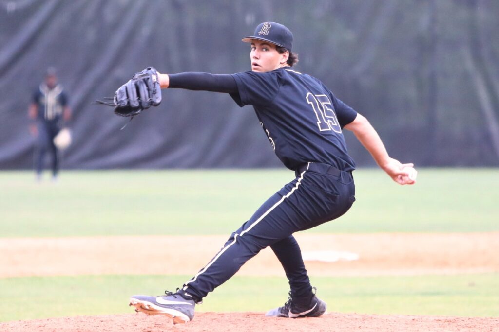 Buchholz's Cohen Lafler (15) pitching in the fourth inning against Tate (Cantonment) in game two of the 6A Region 1 Semifinals. Photo by C.J. Gish
