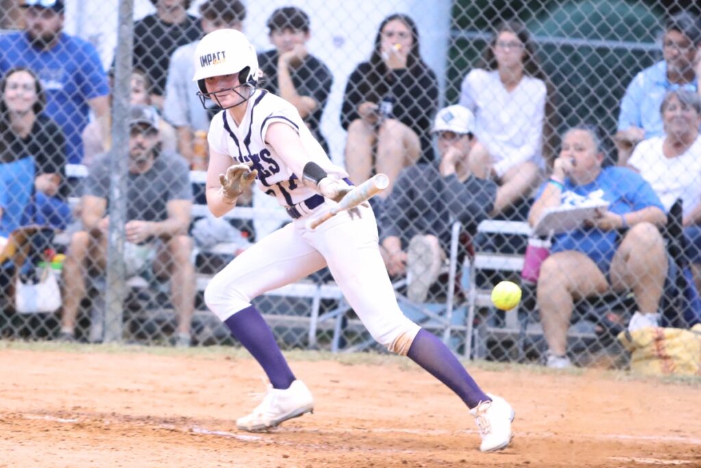 Gainesville's Leanna Bourdage lays down a fifth-inning bunt for a single against Belleview in the 5A Region 2 Quarterfinals. Photo by C.J. Gish