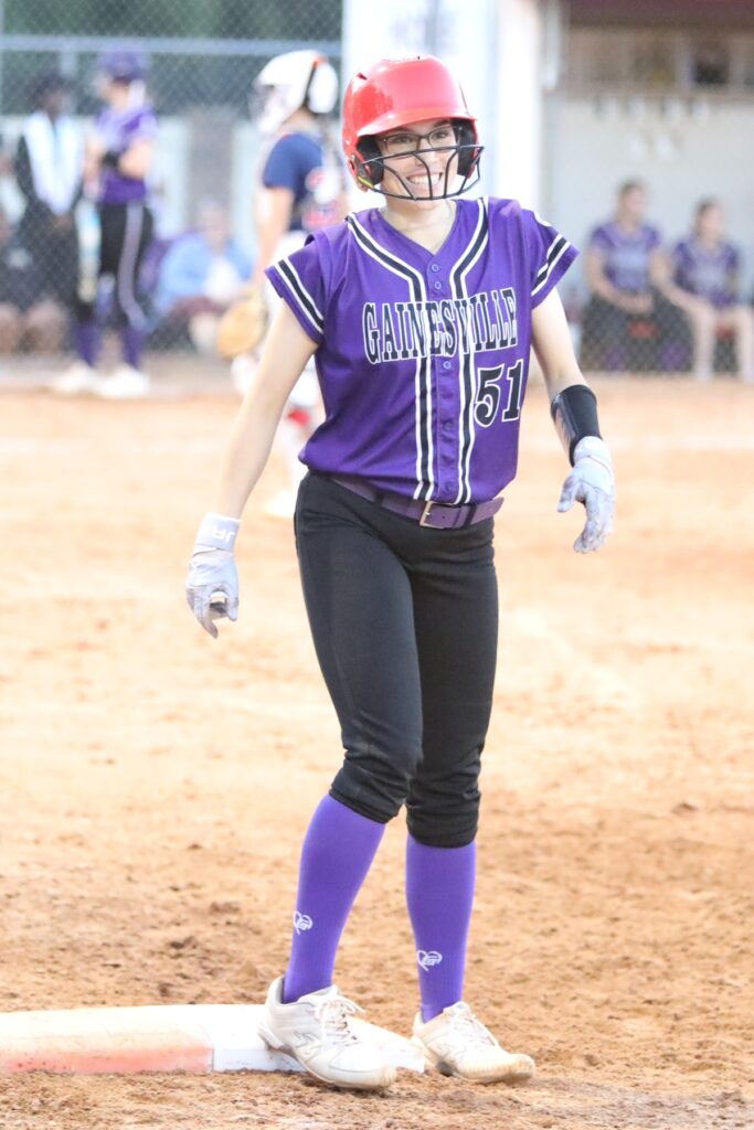 Gainesville's McKenna O'Sullivan all smiles after hitting a two-out one-run single in the sixth inning against Springstead (Spring Hill) in the 5A Region 2 Semifinals. Photo by C.J. Gish