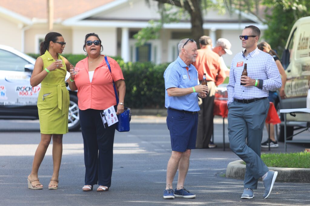 Guests talk and enjoy drinks at Mainstreet's 5th anniversary. Photo by Seth Johnson