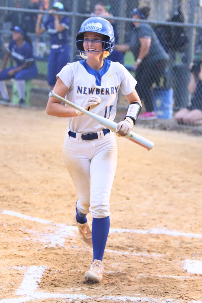 Newberry's Gracie Mattson scores the first run of the game against Cornerstone Charter Academy (Belle Isle) in the 2A Region 2 Quarterfinals. Photo by C.J. Gish