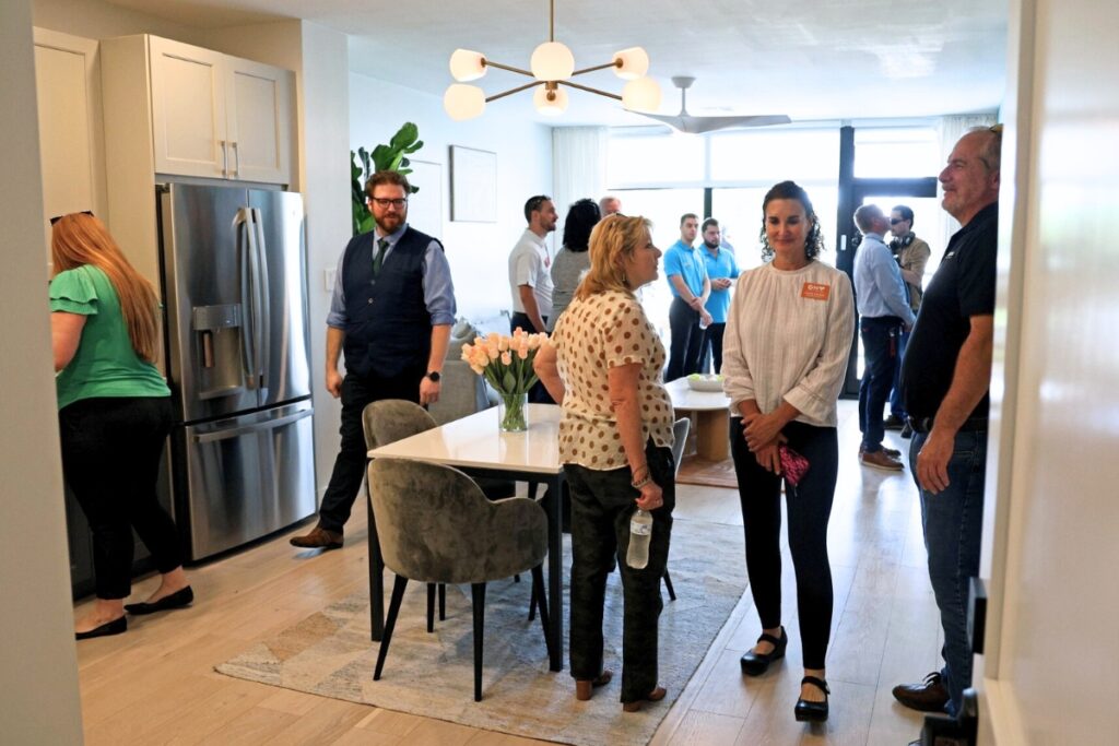 People toured the model unit of the Archer Place condominium complex on Thursday. Photo by Lee Ann Anderson