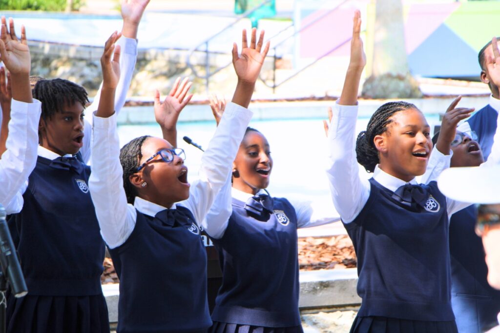 The Saint Barbara Leadership Institute choir performs Lift Every Voice and Sing. Photo by Lillian Hamman