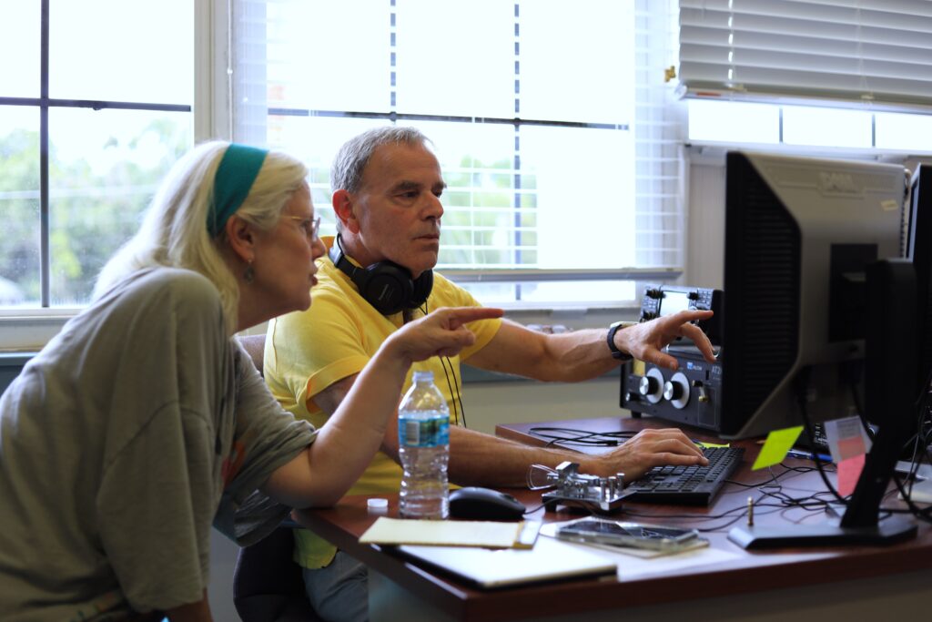 Cy Stanway discusses morse code amateur radio with TK. Photo by Seth Johnson