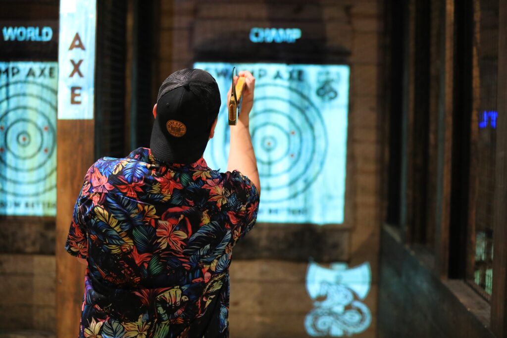 Dylan Teets throws a hatchet inside Swamp Axe. Photo by Seth Johnson