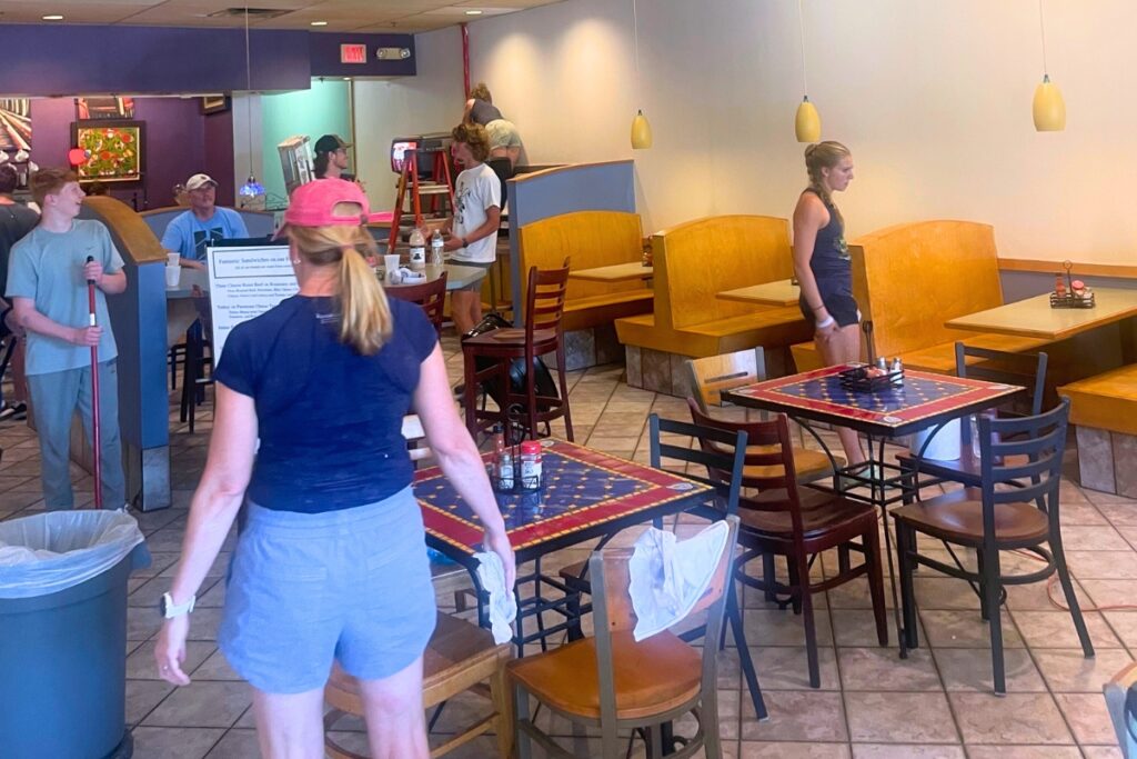 GAR crews thank The Bagel Bakery for financial partnership with a fresh coat of paint. Courtesy of Jason Cole