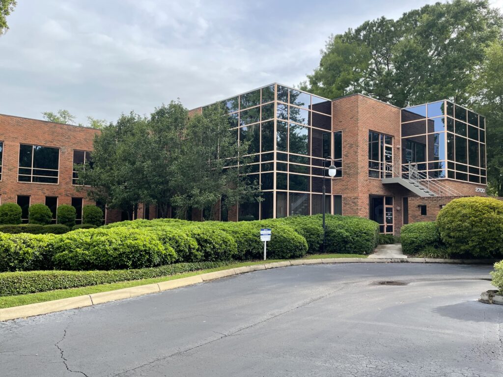 The offices of Koss Olinger are on the second floor of this building off NW 43rd Street.