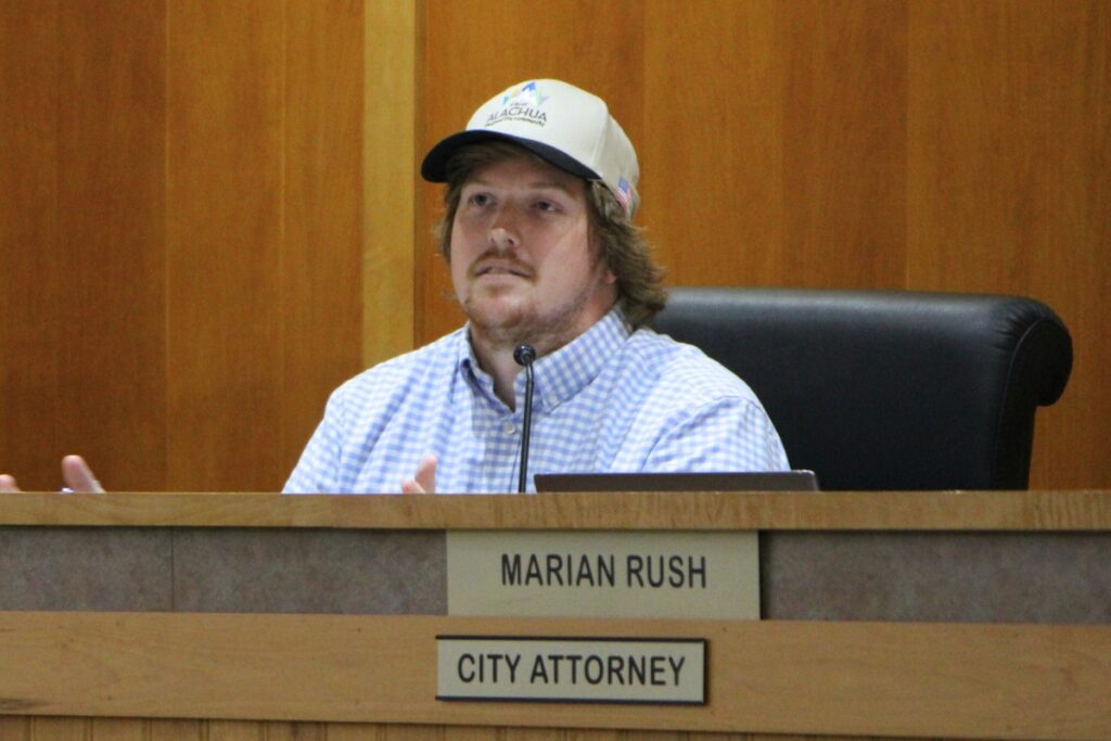 Commissioner Jacob Fletcher moved to hire an attorney to investigate Alachua planners' resignations. Photo by Lillian Hamman