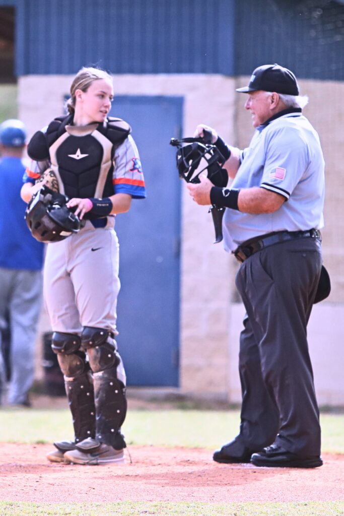 Emma Mansfield (left) played catcher for the P.K. Yonge baseball team during high school. Photo by C.J. Gish