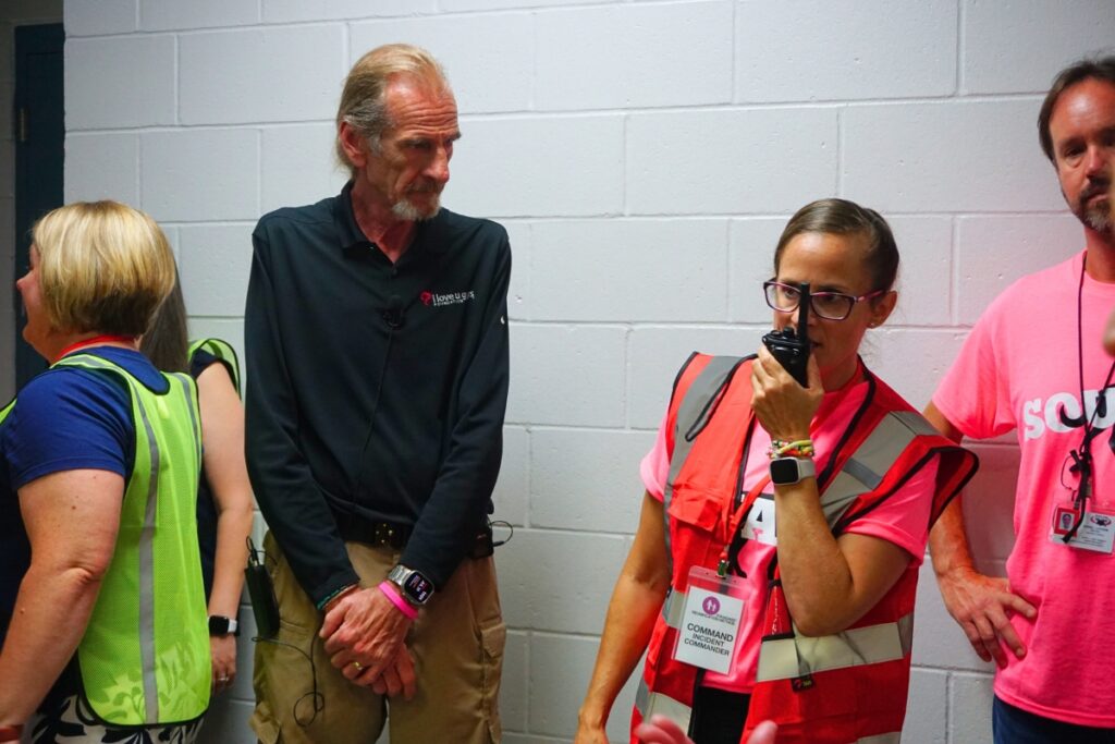 John-Michael Keyes watches ACPS staff perform a mock emergency and reunite students and parents. 