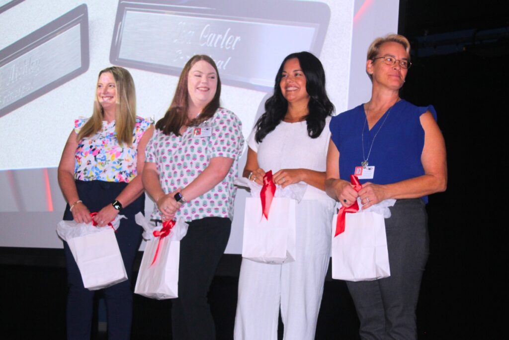 New school principals (from left) Lauren Thompson, Maggie Gardiner, Isa Carter and Jilly Atchley were introduced on Thursday. Photo by Nick Anschultz