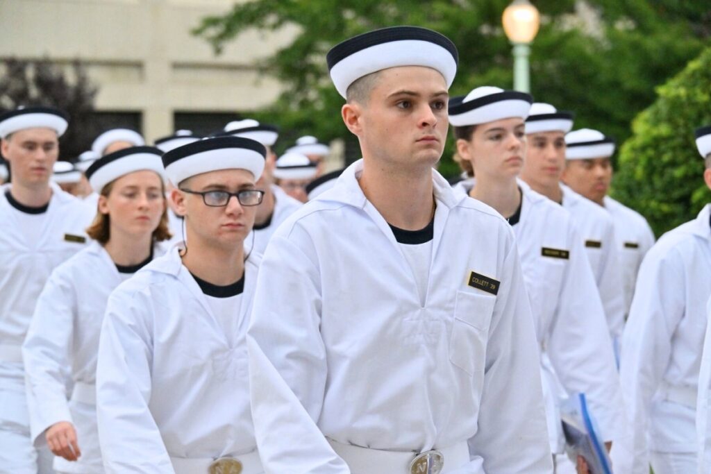William Collett (center) in his U.S. Navy uniform. Courtesy of Tom Collett
