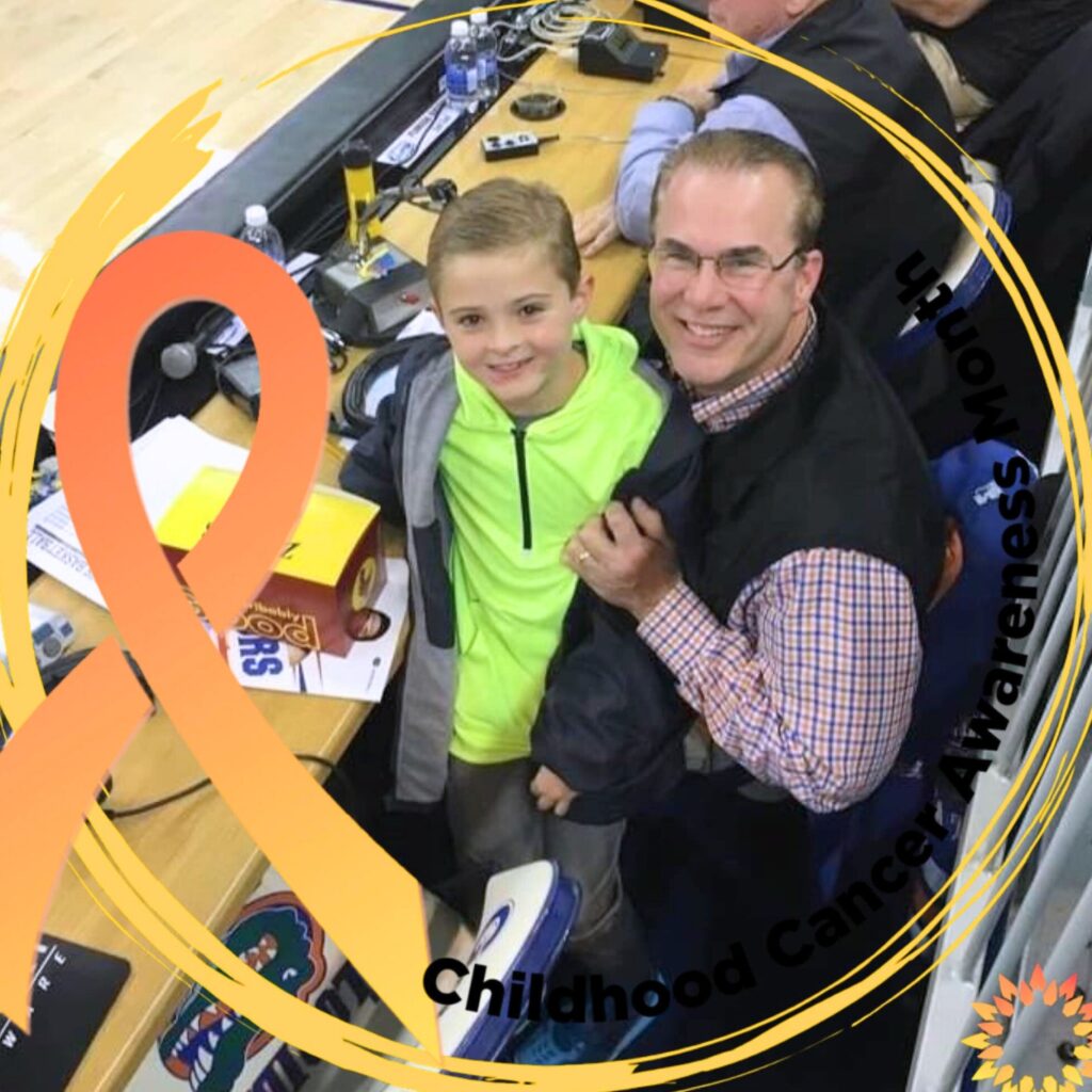 William (left) and Tom Collett at a Florida Gator's mens basketball game. Courtesy of Tom Collett