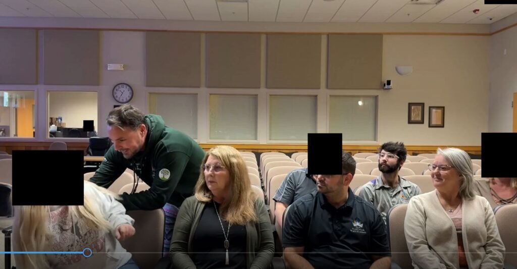 A city of Alachua staff member tickles another employee during a mock-HR policy skit in 2024 Christmas party video. Courtesy of city of Alachua