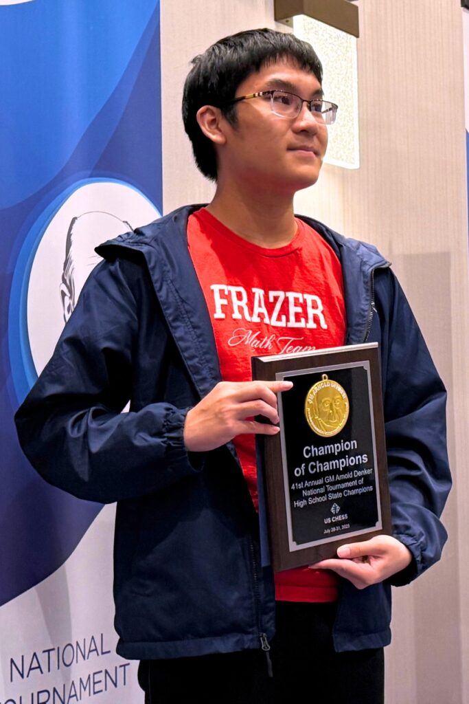 Bach Ngo holds his plaque won at the 41st annual GM Arnold Denker National Tournament of High School State Champions. Courtesy of The Frazer School