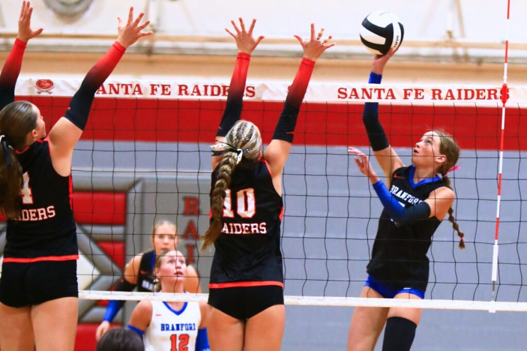 Branford's Lalyn Sikes (7) with a hit against Santa Fe. Photo by C.J. Gish
