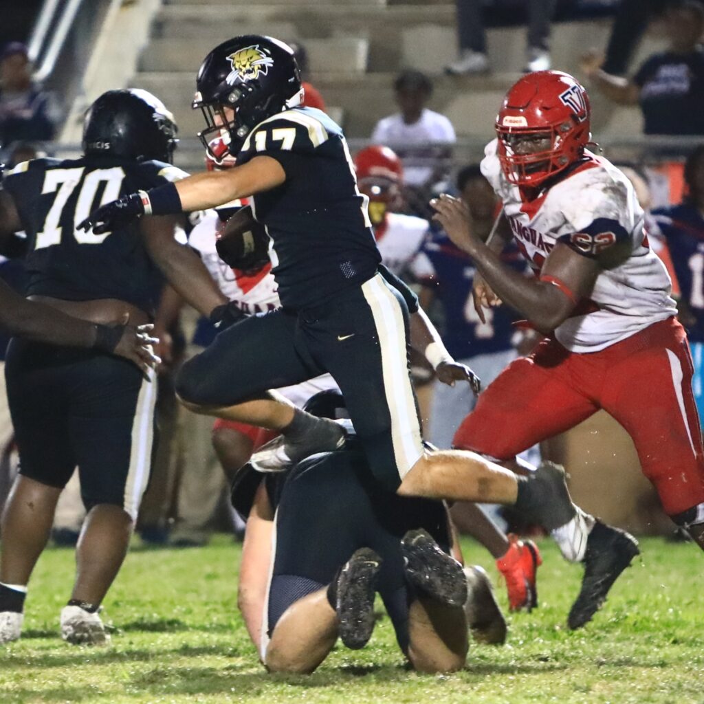 Buchholz's Ashton Norris (17) with a third-quarter reception against Vanguard (Ocala). Photo by C.J. Gish