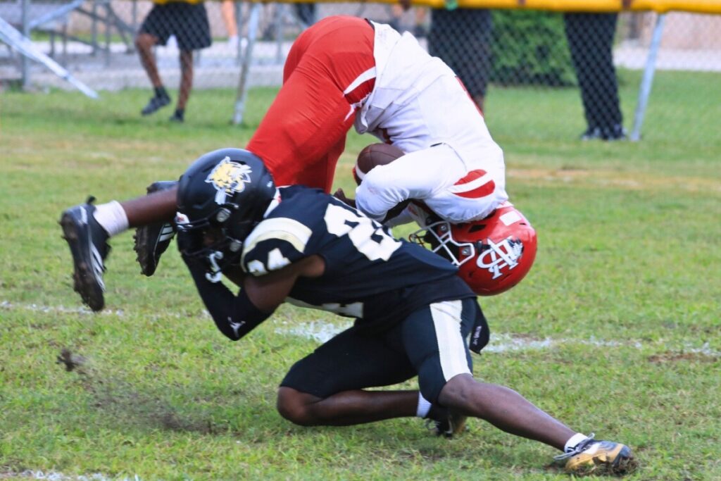 Buchholz's Camron Burse tackles a Vero Beach runner near the goal line. Photo by Seth Johnson 1 (1)