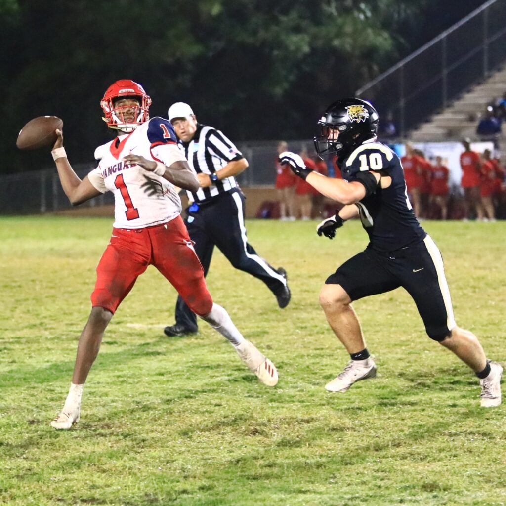 Buchholz's Devin Atalig (10) pressures Vanguard's quarterback. Photo by C.J. Gish