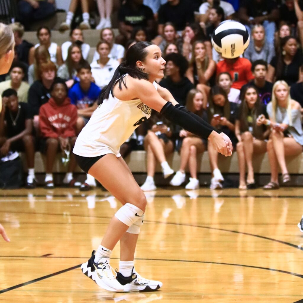 Buchholz's Izzy Carter (8) with a dig against Santa Fe. Photo by C.J. Gish