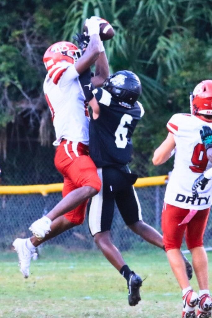 Buchholz's Ja'marionn Garcia breaks up a long Vero Beach throw. Photo by Seth Johnson