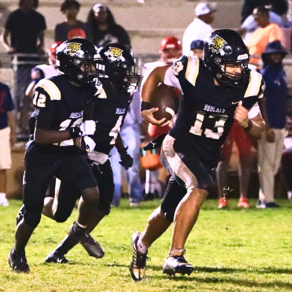 Buchholz's Justin Williams (13) returns the Vanguard (Ocala) fourth-quarter onside kick. Photo by C.J. Gish