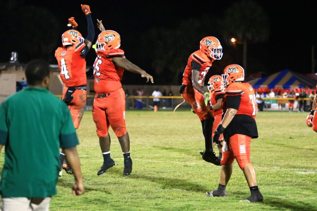 Eastside players celebrate after a fourth-quarter defensive stop against Rickards (Tallahassee). Photo by C.J. Gish