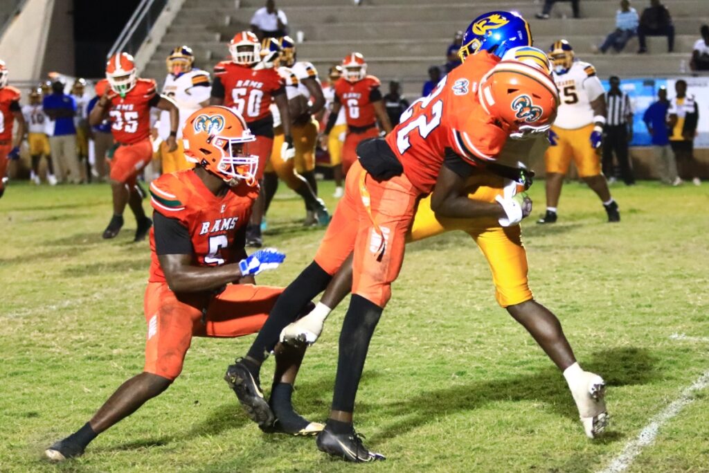 Eastside's Ja'Marian Reaves (22) with a tackle against Rickards (Tallahassee). Photo by C.J. Gish