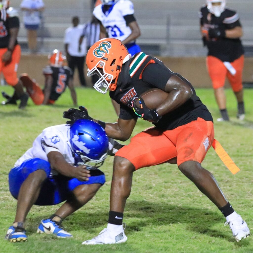 Eastside's Jordan Johnson tries to get past a Belleview defender. Photo by Seth Johnson