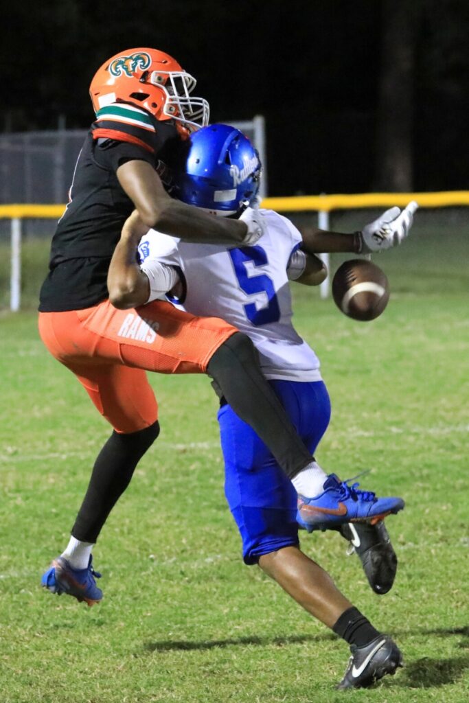 Eastside's Kaleb Mckinnon tries to catch a pass against Belleview. Photo by Seth Johnson