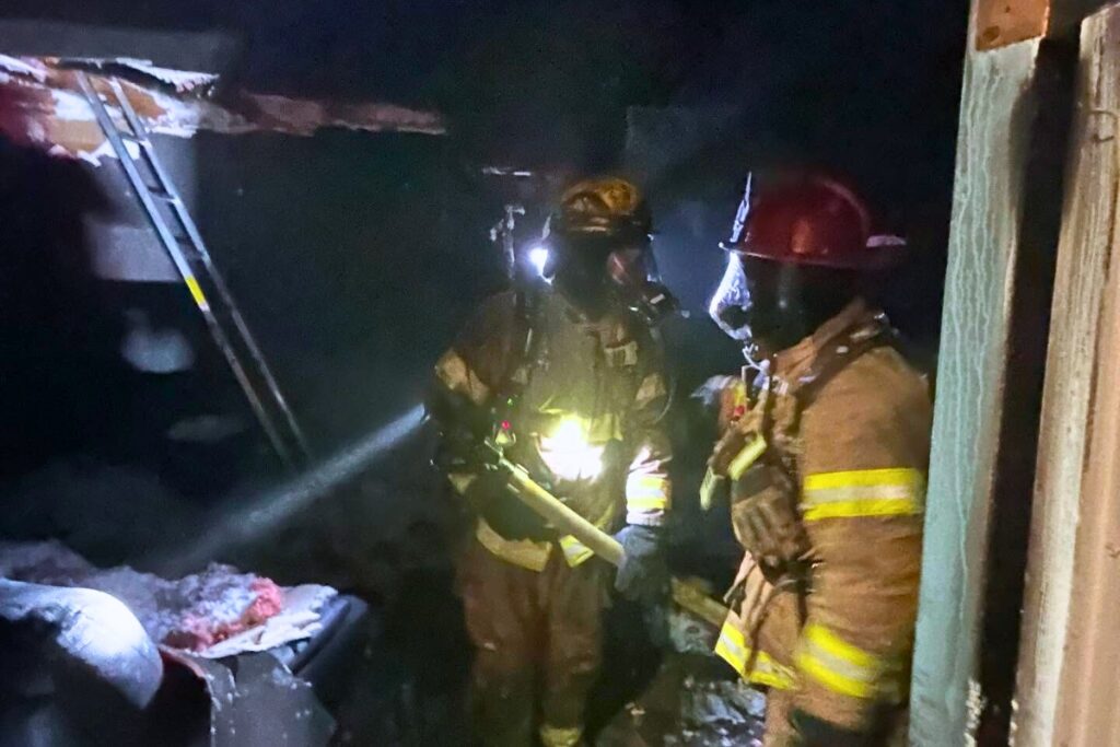 Firefighters at a Camelot Apartments on Tuesday night. Courtesy of GFR