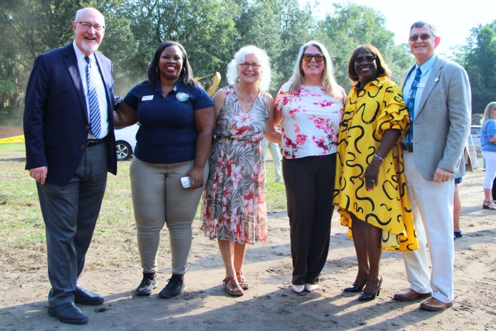 (From left) State, county and city officials Harvey Ward, Latecia Richards, Marihelen Wheeler, Dayna Williams, Shirley Green Brown and Ed Book attend studio groundbreaking. Photo by Lillian Haman