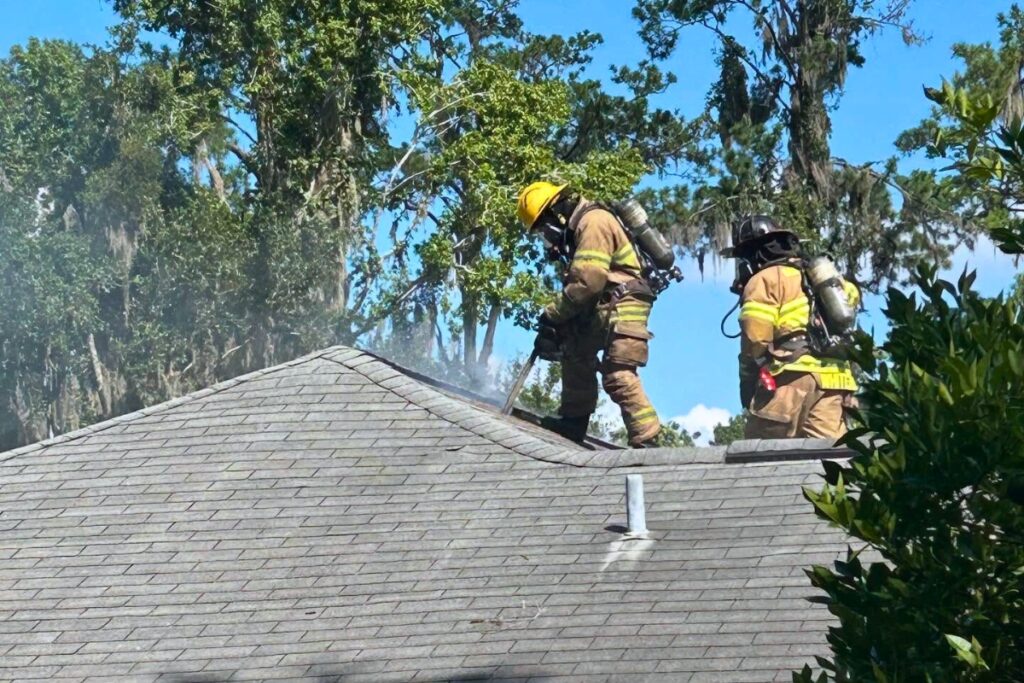 Gainesville Fire Rescue firefighters battle a residential fire at 2620 SW 8th Dr. on Friday morning. Courtesy of GFR