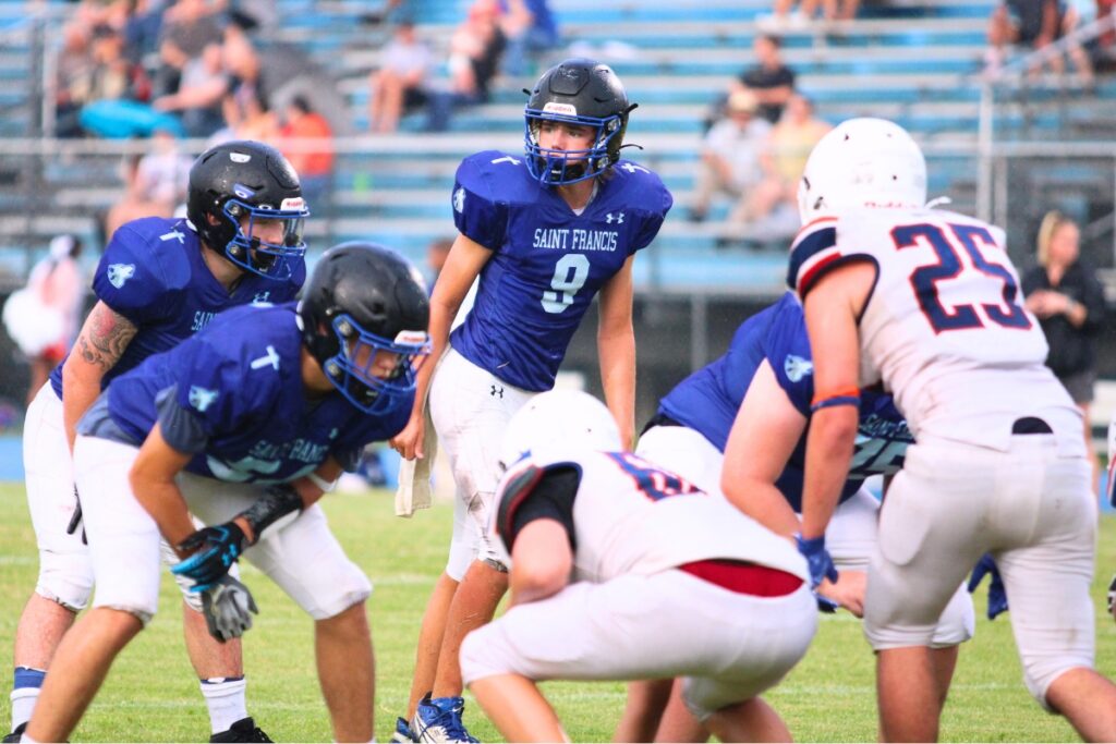 Jake Long (9) returns at quarterback for Saint Francis Catholic Academy this season. Photo by Seth Johnson