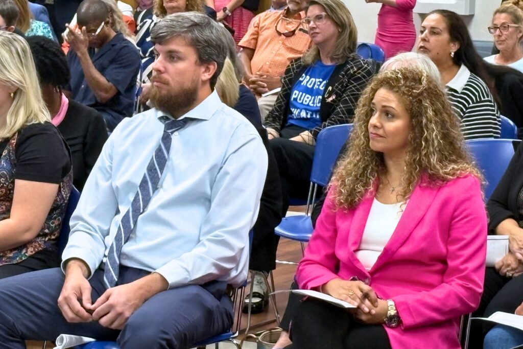 Jeremy Clepper (left) waits to be called on to speak at Wednesday's State Board of Education meeting. Photo by Gary Nelson