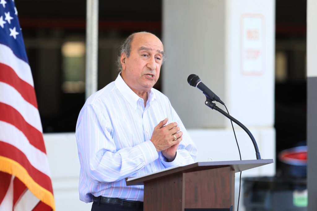 Kinnon Thomas, chair of the Gainesville-Alachua County Regional Airport Authority, speaks at the ribbon cutting for the new parking garage.. Photo by Seth Johnson