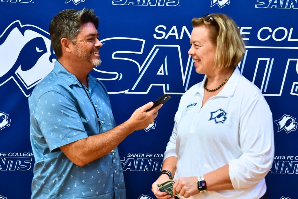 Mainstreet Daily News Sports Director Mike Ridaught (left) interviews Santa Fe College Athletics Director Chanda Stebbins. Photo by Janalyn Peppel