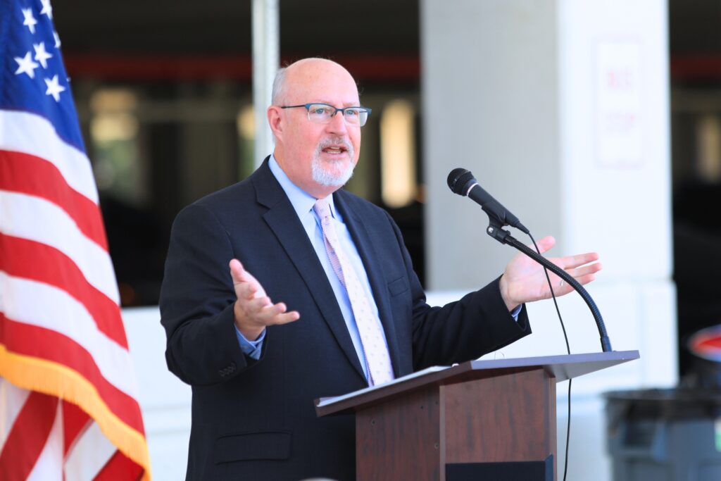 Mayor Harvey Ward speaks at the ribbon cutting for Gainesville Regional Airport's new parking garage and encouraged residents to grow the airport in order to expand options. Photo by Seth