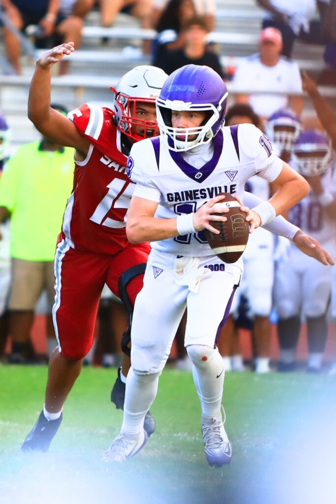 Santa Fe's Ziren Turner sacks Gainesville quarterback Calvin Comstock on Thursday. Photo by C.J. Gish