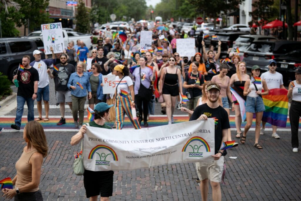 The Price Community Center of North Central Florida held a rally protesting the removal of the rainbow crosswalks in downtown Gainesville on Friday. Photo by Tim Rodriquez