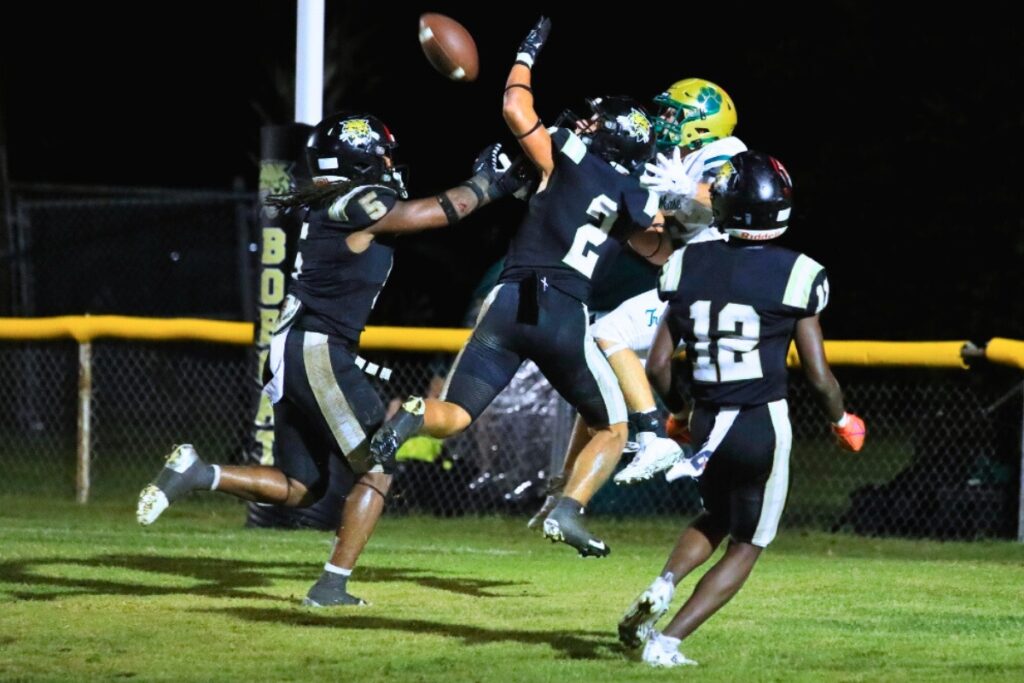 Buchholz defenders break up a Nease (Ponte Vedra) pass into the end zone. Photo by Seth Johnson