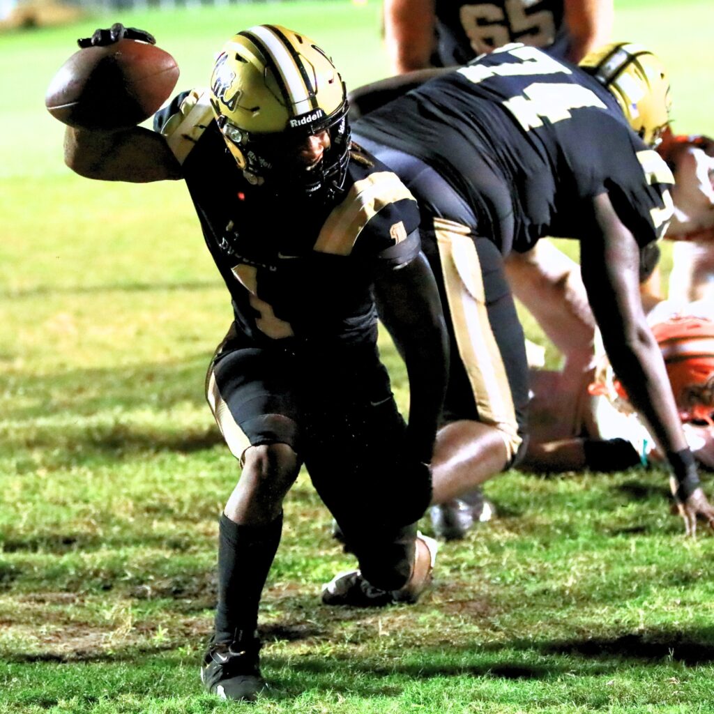 Buchholz's Chris Johnson (1) scores a third-quarter touchdown against Eastside. Photo by C.J. Gish