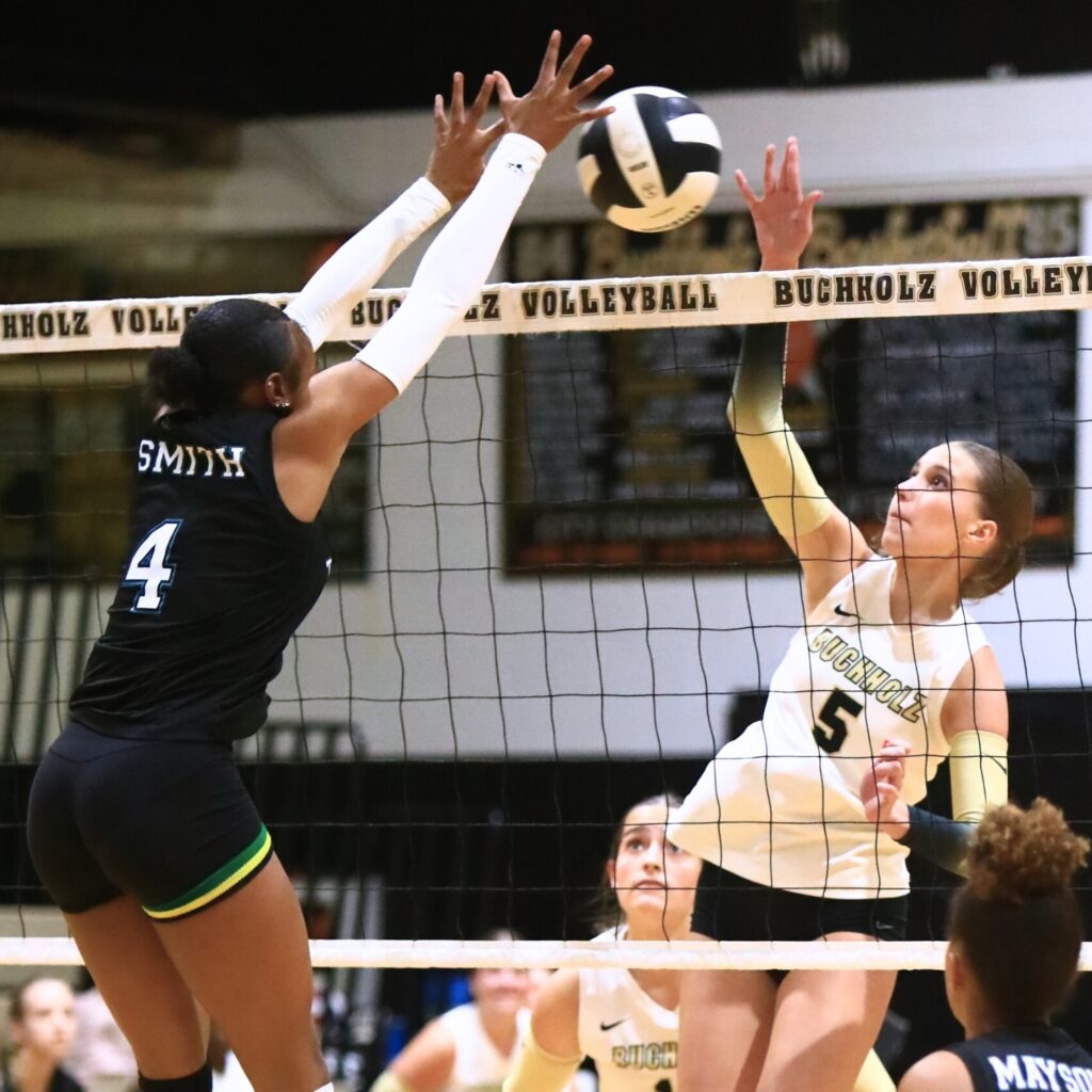 Buchholz's Victoria Trucco (5) with a hit against West Port (Ocala). Photo by C.J. Gish
