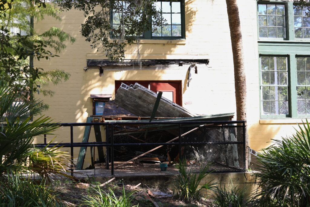 Debris blocks an entrance as the Thelma Boltin Center gets demolished. 