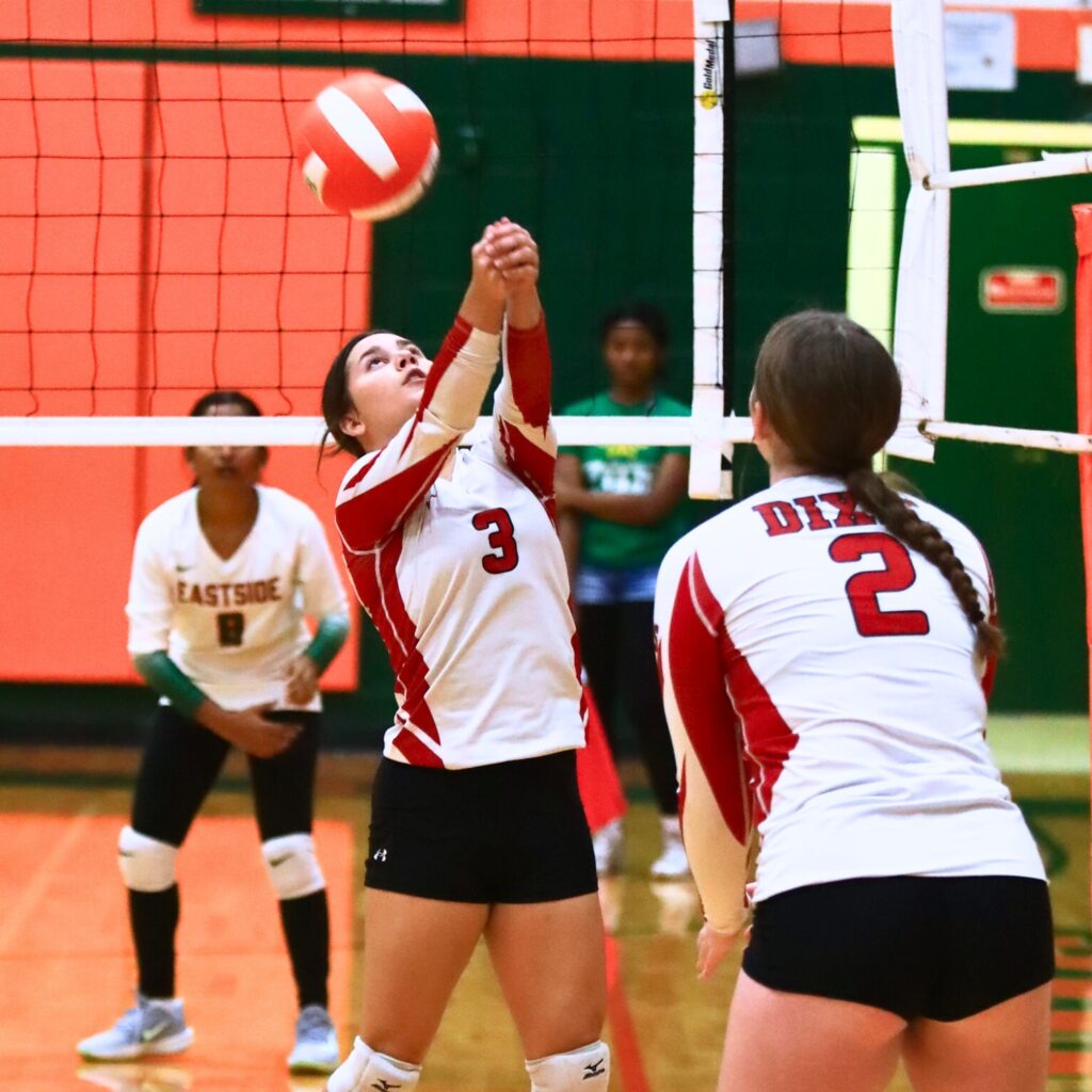 Dixie County's Riley Whitaker (3) with a dig against Eastside. Photo by C.J. Gish