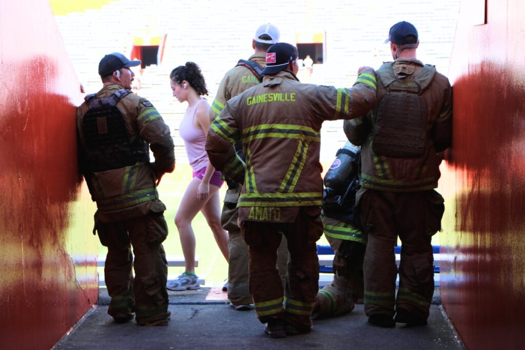 Gainesville Fire Rescue crews prepare to climb 14 flights of stairs at Ben Hill Griffin Stadium to honor 911 victims. Photo by Lillian Hamman