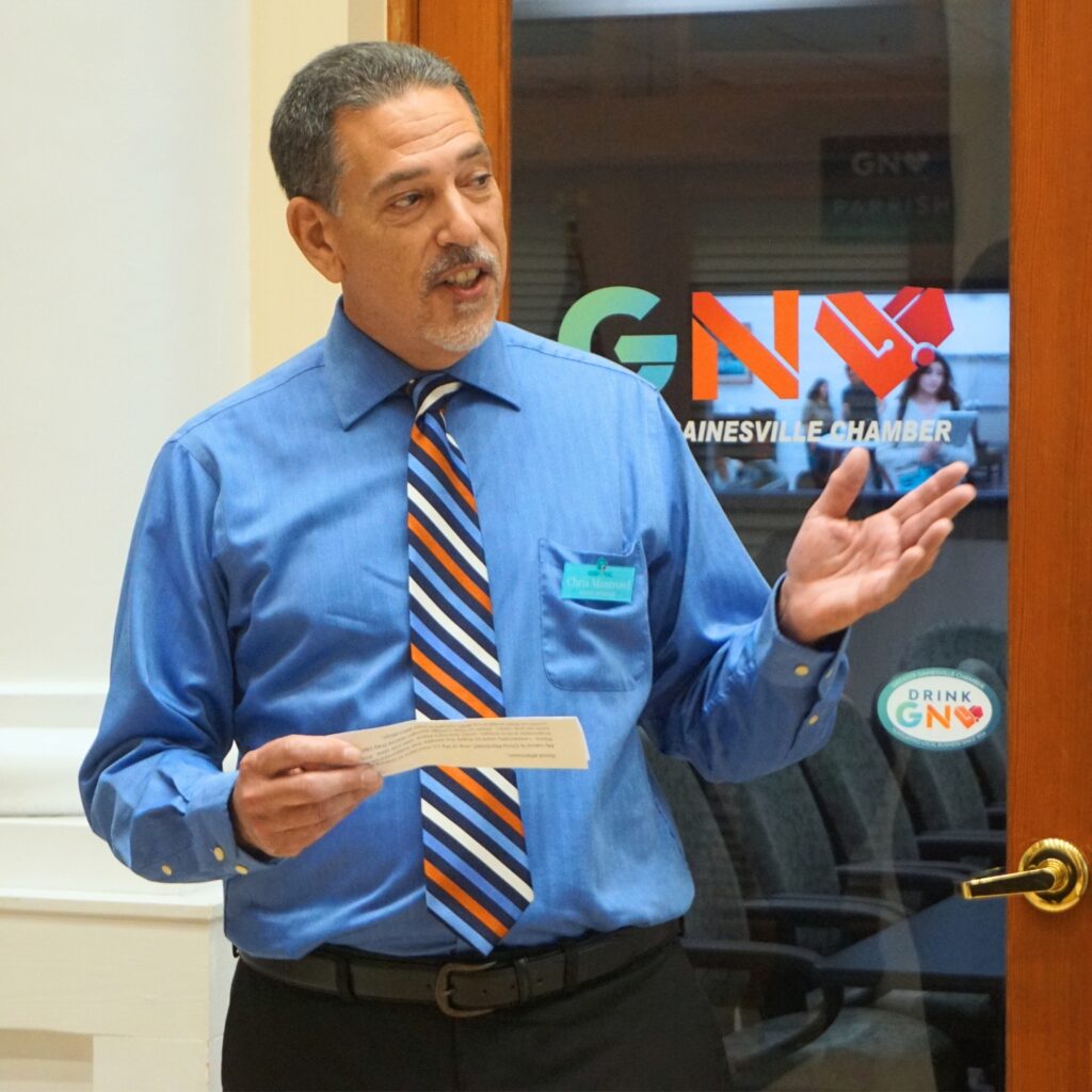 Gianna's Place Board Chair Chris Montrowl speaks at a ribbon-cutting ceremony on Monday. Photo by Kirstin Rabin