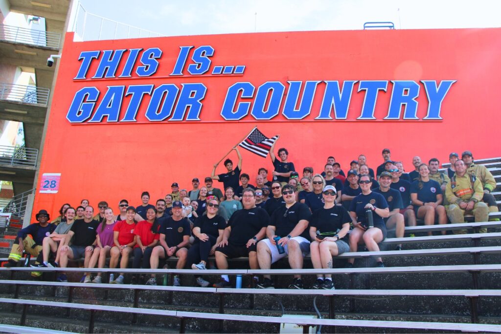 Members of Alachua County Fire Rescue honor the lives lost on 9-11-01 with an annual stair climbing event at Ben Hill Griffin Stadium. Photo by Lillian Hamman